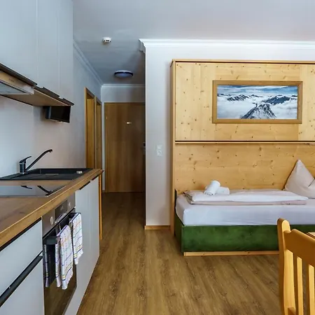 Hubertus Alpine Living アパートホテル オーバータウエルン